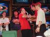 Winner gets his trophy - John from Skyy Vodka and Ken Hall congradulate Christian on another victory.
